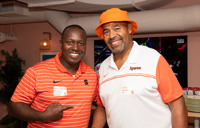 Deon Maddox ’95, G’00 and David Brooks '82